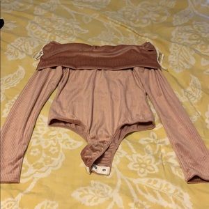 Pink body suit